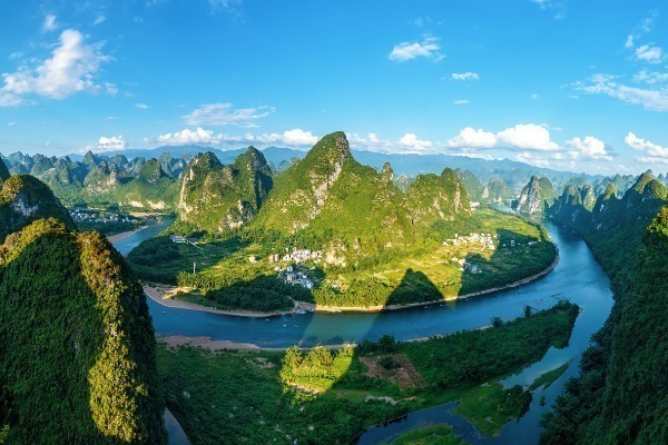 A classic aerial view of the First Bend of the Li River under sunlight